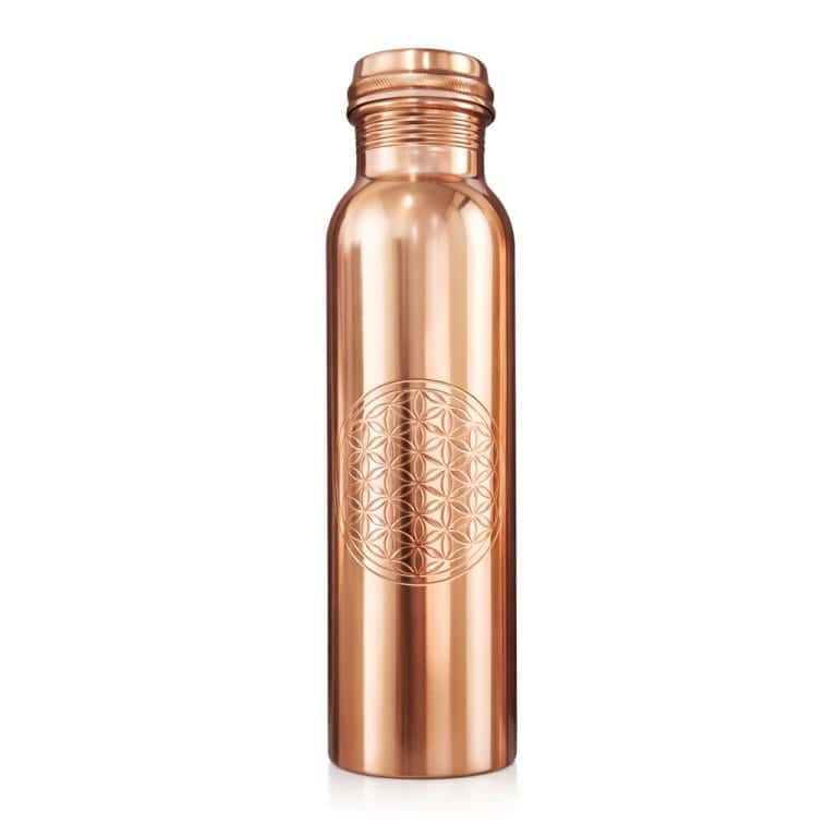 Pure copper water bottle 950ml with Flower of Life engraving on clean white background