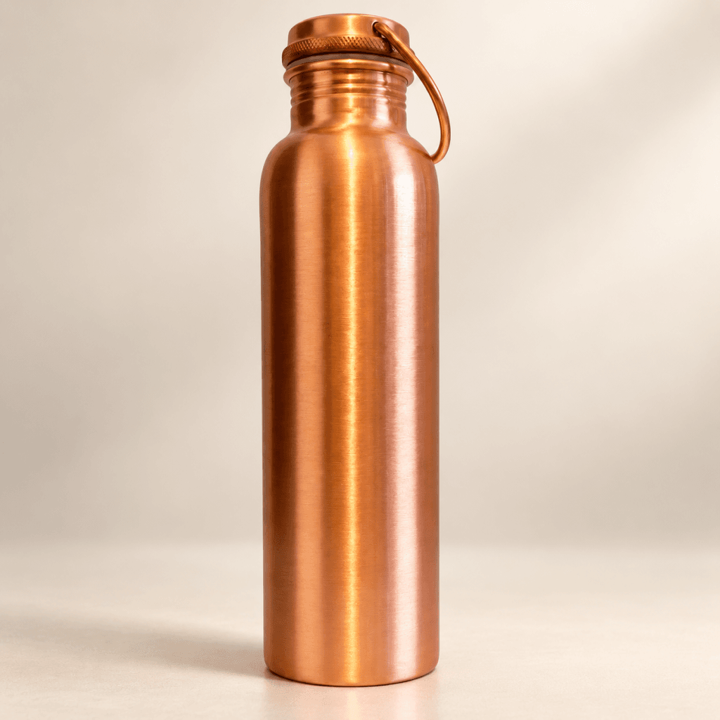 Matte copper water bottle 1 litre — finish detail, AM Stores UK